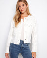 White denim jacket featuring frayed hem and eyelet details, complete with button closure and chest flap pockets by Charlie B.