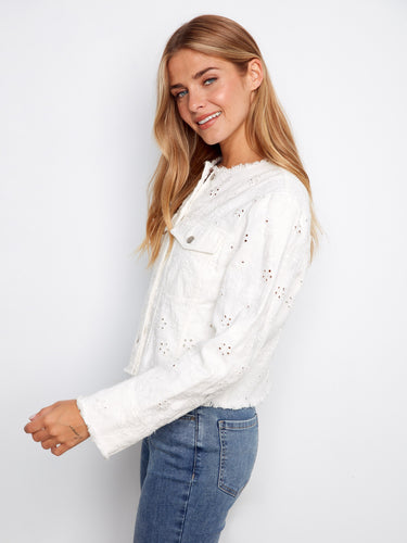 Beautifully detailed white denim jacket featuring exquisite eyelet design and functional flap chest pockets by Charlie B.