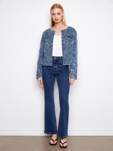 Blue stretch denim jacket showcasing flap chest pockets and intricate eyelet patterns for a chic look by Charlie B.