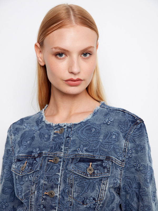 Show off the detailed eyelet design on this medium blue denim jacket, featuring flap chest pockets by Charlie B.