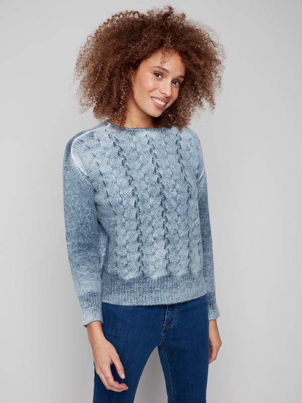 Blue denim sweater featuring drop shoulders and a stylish cable knit pattern for a relaxed look by Charlie B.