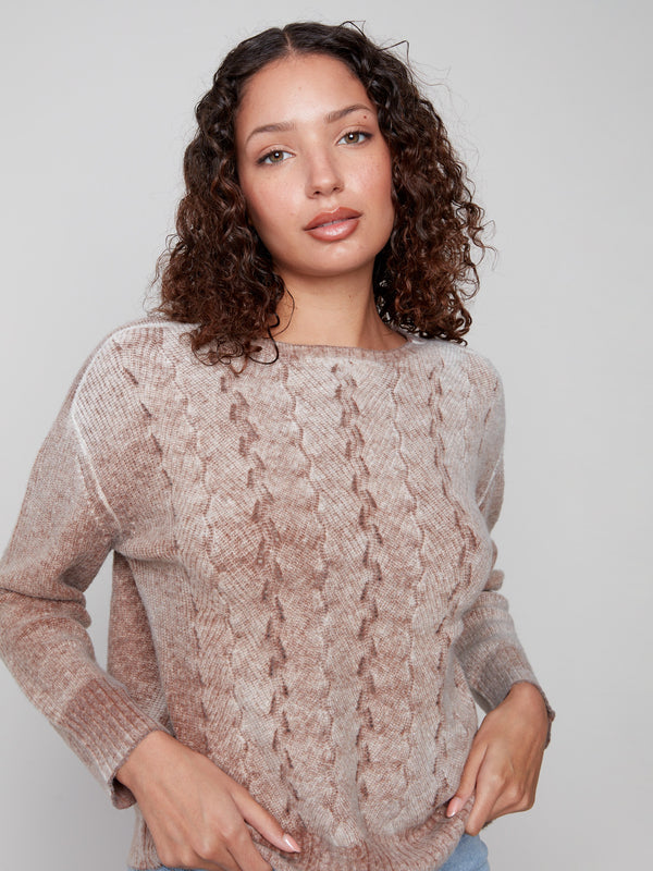 Stylish sepia sweater with intricate front cable knit design enhancing its texture by Charlie B.