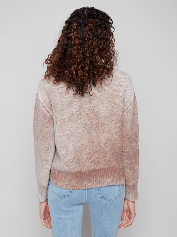 Sophisticated sepia pullover crafted with ribbed details on the cuffs and hemline by Charlie B.