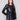 Black faux leather blazer with princess seams for a flattering silhouette, featuring tailored elegance by Charlie B.