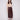 Cabernet faux leather midi skirt featuring side pockets, paired with a beige top and brown ankle boots by Charlie B.