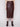 Cabernet faux leather midi skirt with a slit front hem, styled with a beige top and brown ankle boots by Charlie B.