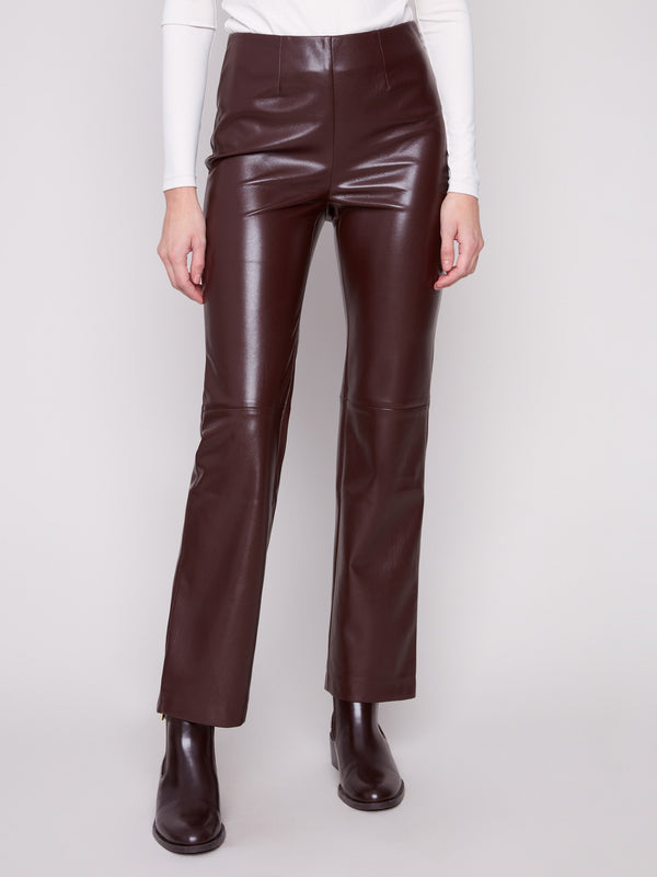 Long length cabernet faux leather pants with an elastic waist band for ultimate comfort by Charlie B.