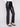 Featuring an elegant seam above the knee, these black faux leather pants offer a modern look by Charlie B.