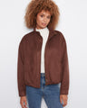 Brown jacket with a stand collar, perfect for a relaxed fit and versatile style. By Charlie B.