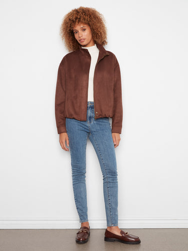 Classic brown jacket crafted with attention to detail, ensuring timeless appeal. By Charlie B.