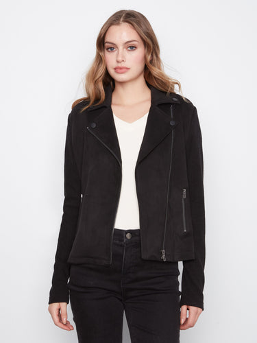 Black faux suede moto jacket with rib knit sleeves, featuring a notched lapel collar and sleek design by Charlie B.