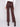 Mocha-colored pants with back welt pockets, combining practicality and elegance by Charlie B.