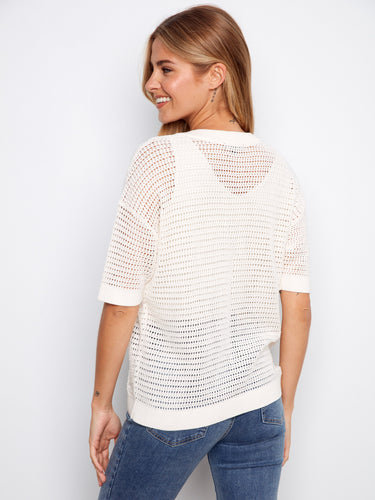 White cotton crochet top featuring elegant elbow sleeves and a sophisticated notch collar for versatile styling by Charlie B.