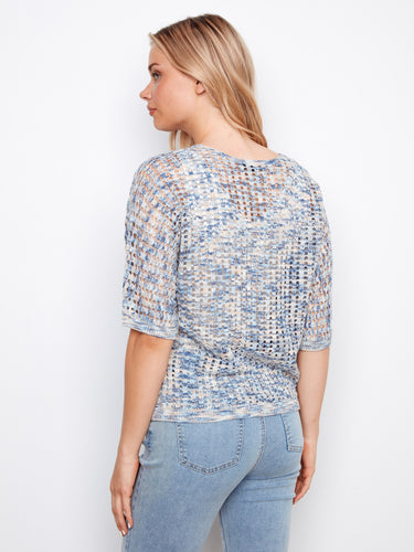 Elbow sleeves add elegance to the bluebell fishnet dolman sweater by Charlie B.
