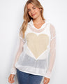 White fishnet hoodie sweater with long sleeves and a gold heart design by Charlie B.