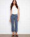 Denim pants with a stylish flared fit, featuring unique bow patch pockets for added charm. Crafted with attention to detail by Charlie B.