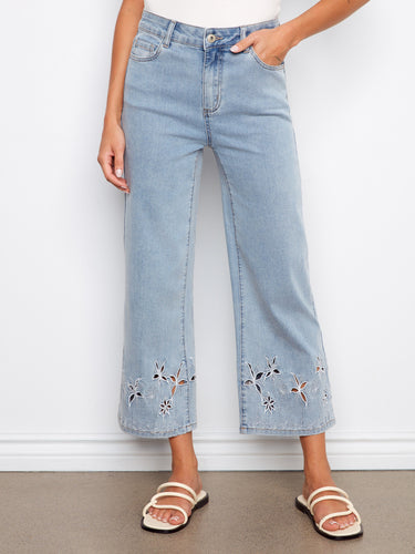 These cropped length jeans feature five pockets and charming embroidery, perfect for casual outings. Crafted by Charlie B.