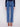 Five-pocket design in medium blue denim paired with a dark top for style and function by Charlie B.