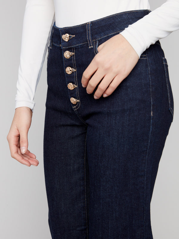 Jeans with unique embellished button closure add a touch of sophistication to your wardrobe. Perfectly crafted fashion by Charlie B.