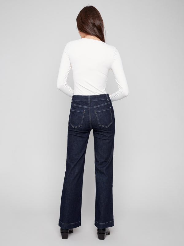 Crafted from stretch denim, these deep blue jeans ensure comfort and flexibility while maintaining a fashionable silhouette by Charlie B.