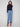 Medium blue jeans with a cropped length and stylish fringe details at the hem, perfect for casual outings by Charlie B.