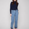 Medium blue jeans with a cropped length and stylish fringe details at the hem, perfect for casual outings by Charlie B.