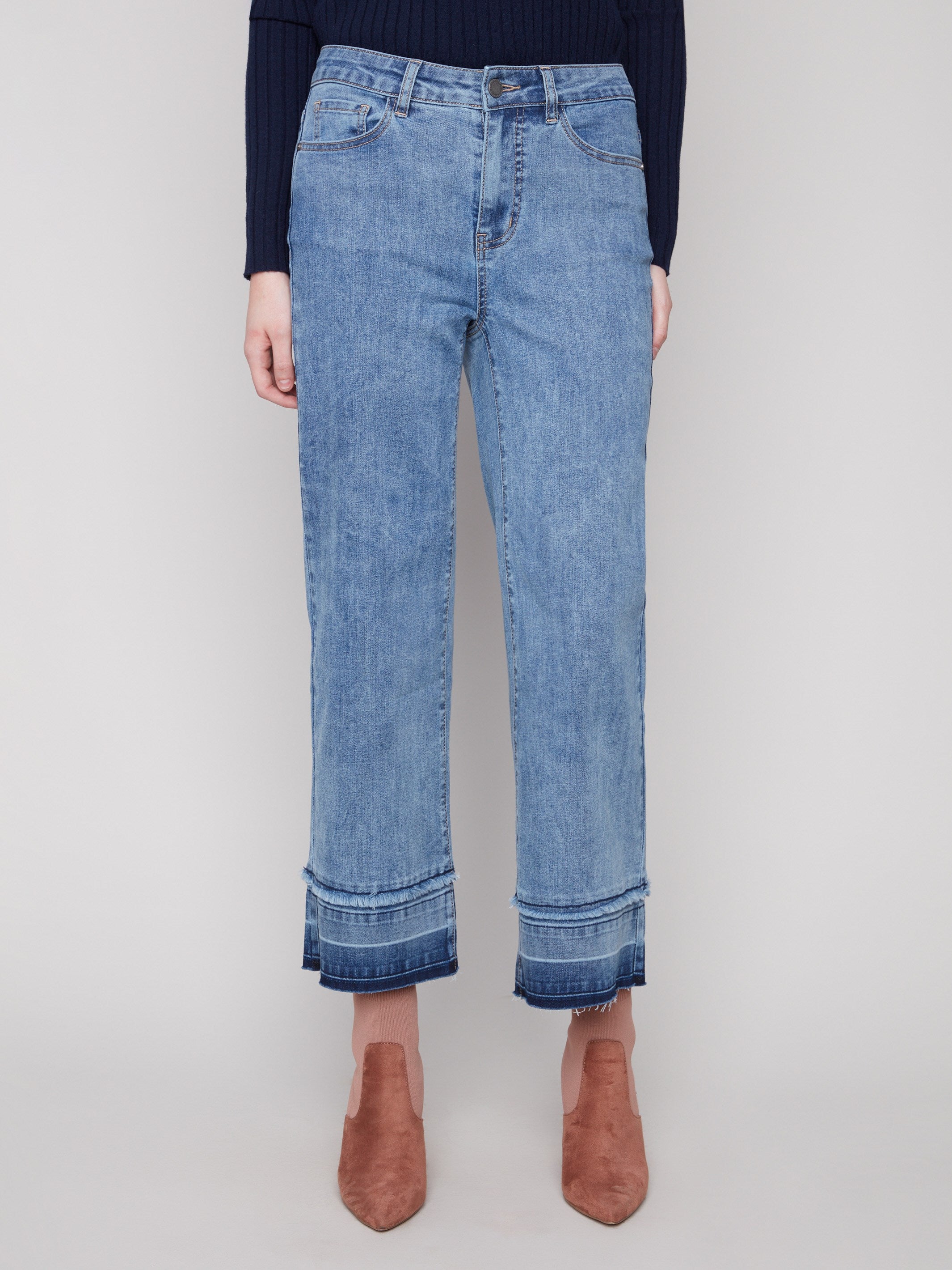 These jeans feature a comfortable flare fit and regular rise, adding a trendy touch to any outfit by Charlie B.