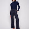 Dark blue denim jeans with a flattering flare fit, featuring stretch material for added comfort by Charlie B.