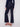 These dark blue jeans feature durable stretch denim, ensuring flexibility and style in every step by Charlie B.