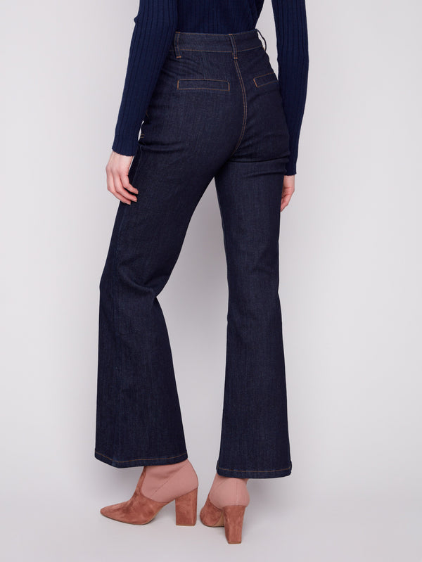 These dark blue jeans feature durable stretch denim, ensuring flexibility and style in every step by Charlie B.