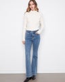 Flare fit jeans in stretch denim with a button-zip closure, designed for a chic casual look by Charlie B.