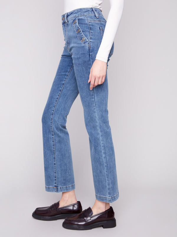 Regular rise flare leg jeans in medium blue with side pockets, by Charlie B.
