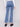 Medium blue jeans showcasing back pockets and a sleek flare leg design by Charlie B.