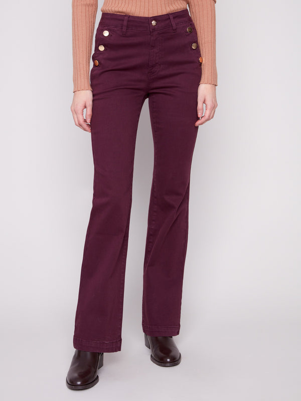 Long length berry pants with chic button details on the side pockets, perfect for any occasion by Charlie B.