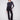 Black flare ponte pants featuring a comfortable elastic waistband and chic decorative buttons by Charlie B.