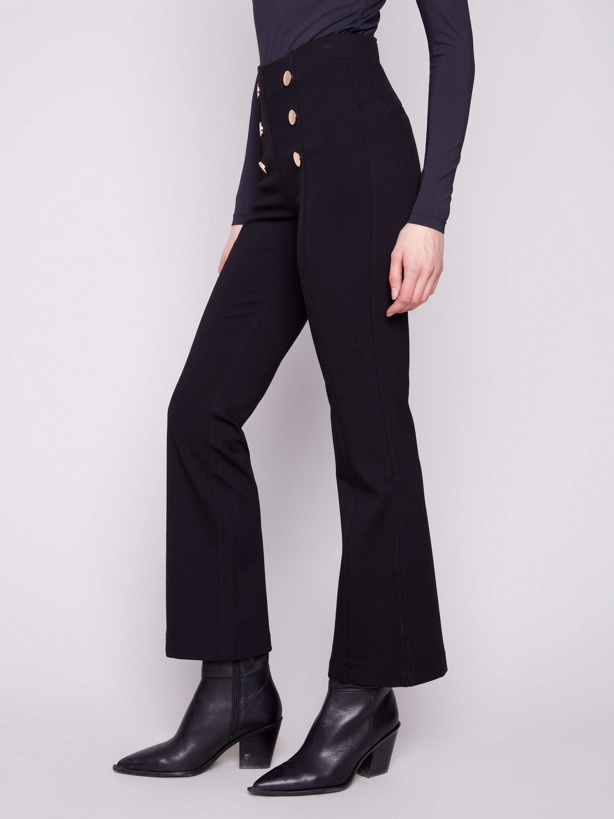 Stretch ponte material in these black flare pants offers both style and comfort, complete with decorative buttons by Charlie B.