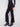 Stretch ponte material in these black flare pants offers both style and comfort, complete with decorative buttons by Charlie B.