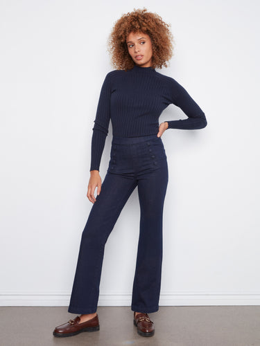 Decorative sailor buttons add a unique touch to these fashionable pants by Charlie B.