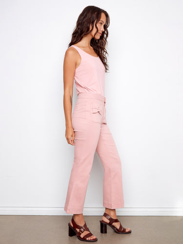 Chic design with unique bow patch pockets and cropped length, these pants are versatile for any occasion by Charlie B.