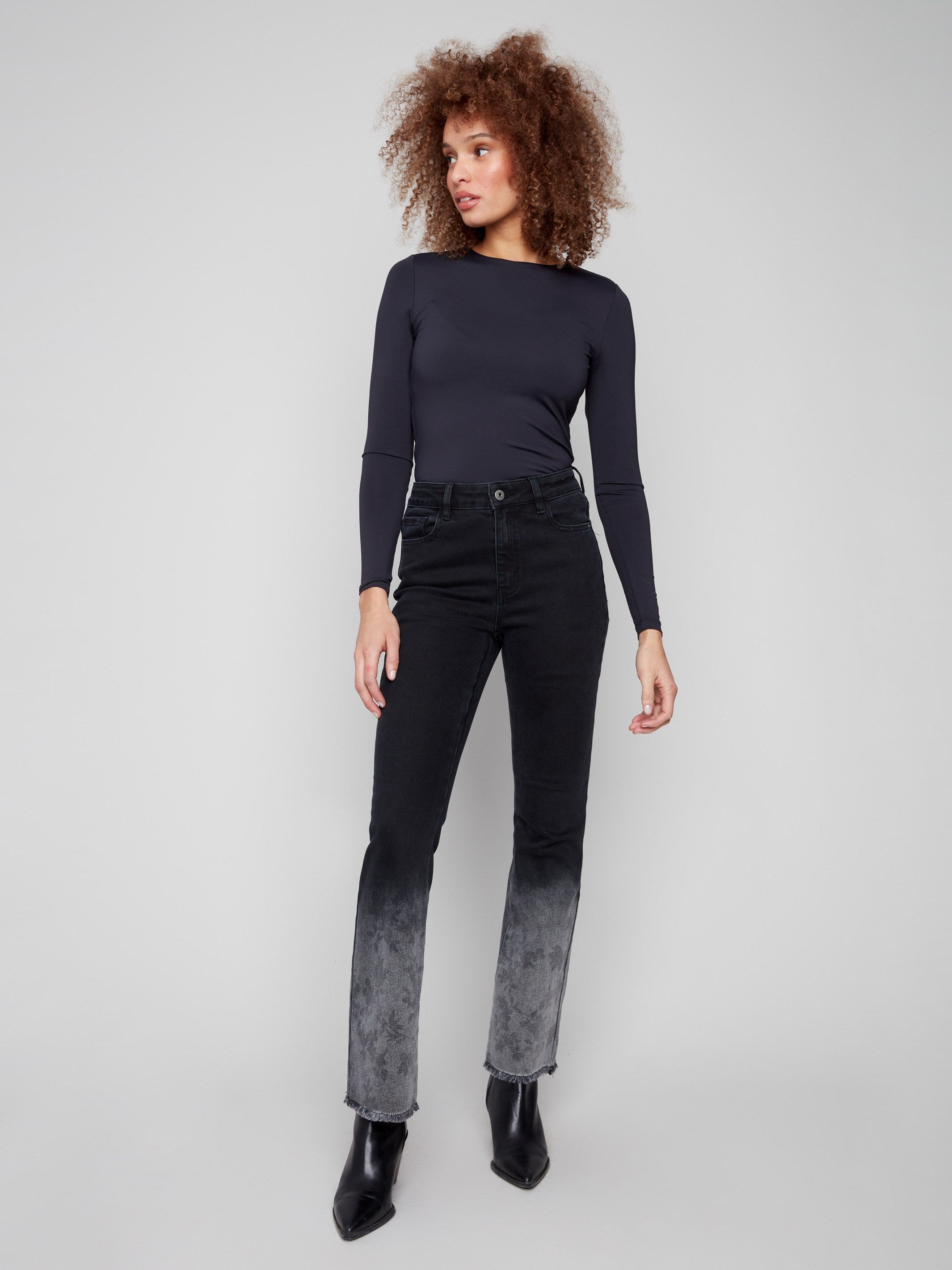 Five-pocket charcoal jeans with a unique floral washed hem, designed for everyday elegance by Charlie B.