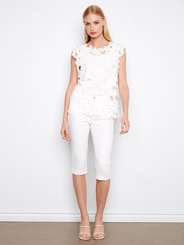 The cap sleeves on this top offer a stylish touch, enhancing its overall charm with a modern twist by Charlie B.