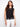 Stylish black crochet top with cap sleeves, offering a modern twist on classic elegance by Charlie B.
