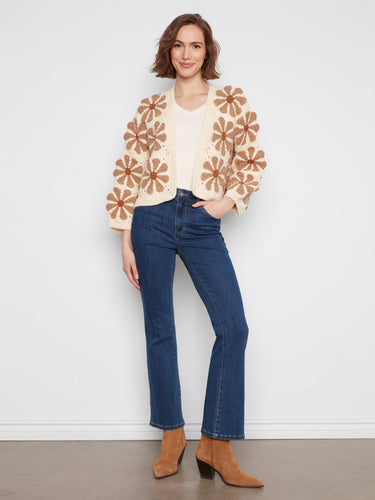 Cropped ecru crochet cardigan adorned with large floral designs and an open-front style by Charlie B.