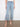 Denim jeans in light blue featuring a wide leg and intricate floral cutouts at the hem for added flair by Charlie B.