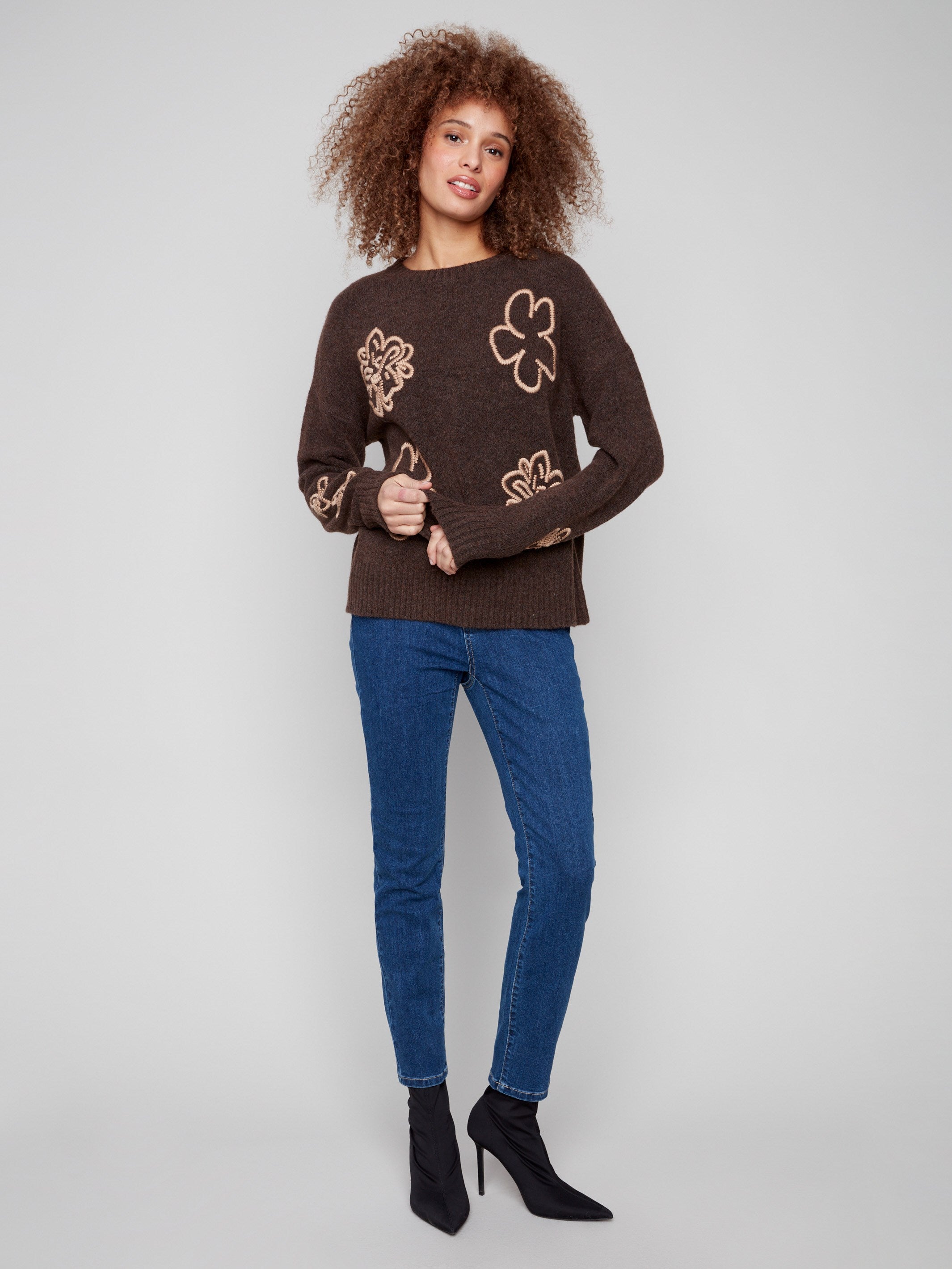 Stylish heather brown sweater featuring an embroidered floral design and ribbed hem, perfect for any occasion by Charlie B.