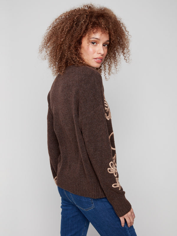 Elegant brown sweater with intricate floral embroidery and a comfortable crew neck, ideal for layering by Charlie B.