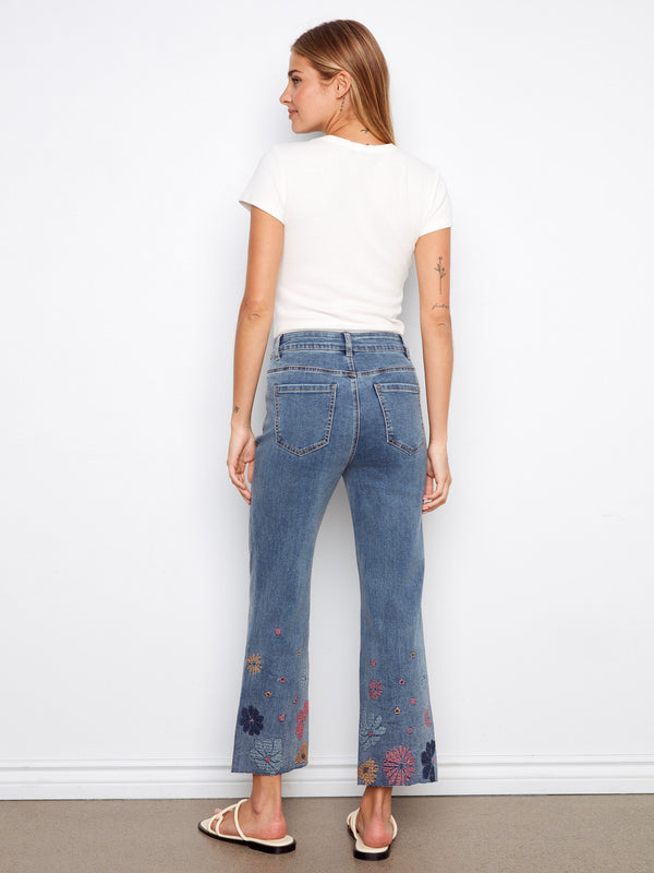 Crafted from stretch denim, these jeans provide comfort alongside chic pixelated embroidery accents. By Charlie B.