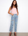 Light blue jeans with a cropped length and floral embroidery, ideal for casual outings by Charlie B.