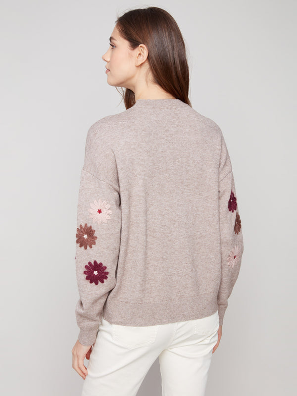 Heather taupe sweater featuring intricate floral embroidery and a comfortable relaxed fit design by Charlie B.