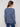 Tulip-colored sweater crafted from luxurious cable plush knit, highlighted by ribbed cuffs and floral details by Charlie B.